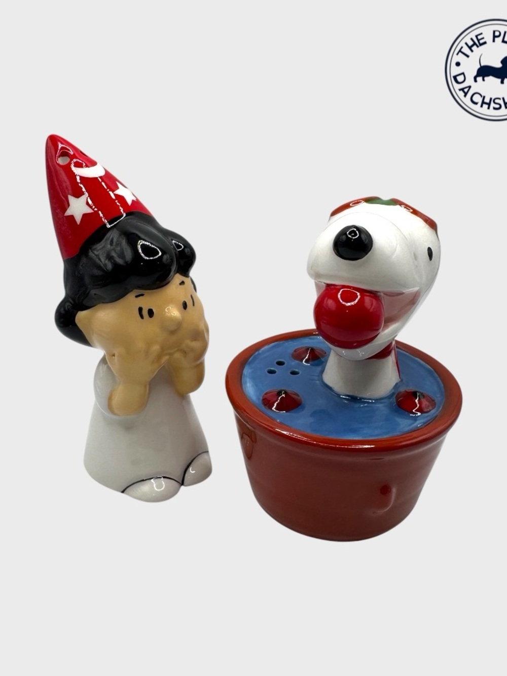 Snoopy and Lucy Bobbing for Apples Shaker Set